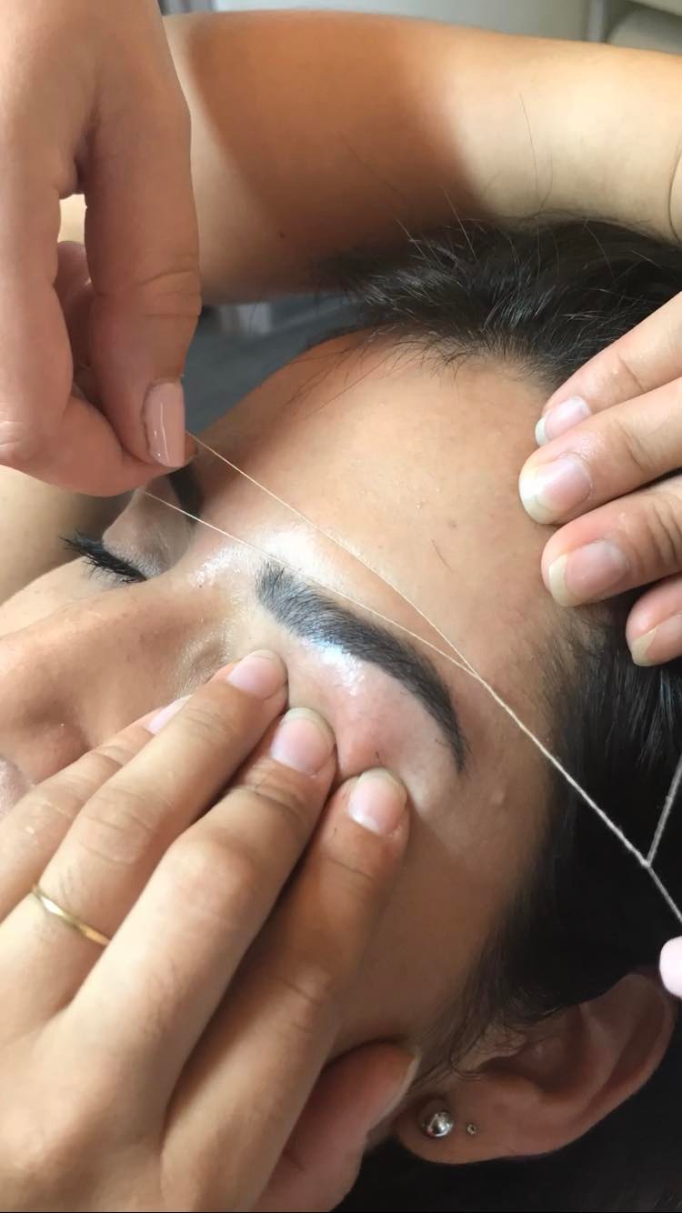 Epilation du visage au fil